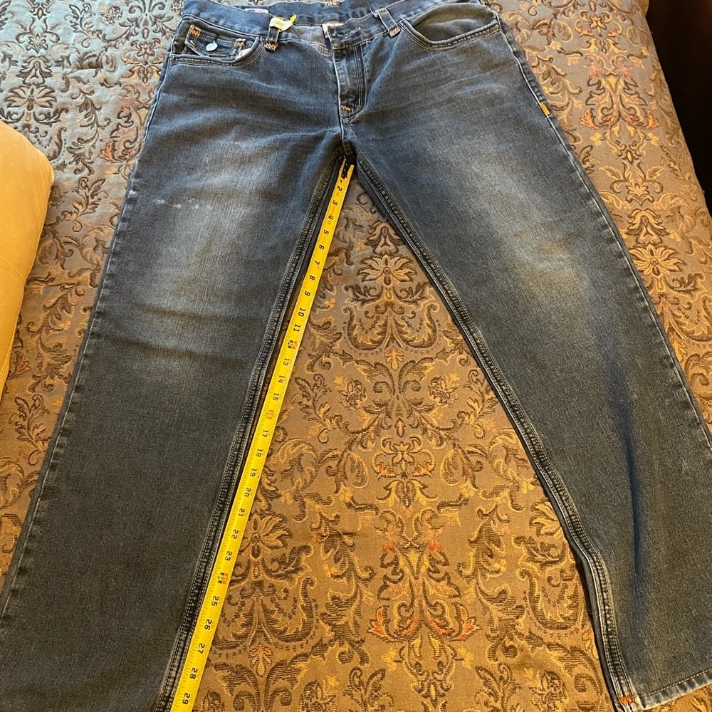 Men's True Religion Jeans 38x31. Tailored to length 31 by cleaners